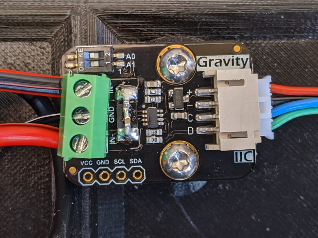 DFRobot I2C wattmeter with soldered capacitors.